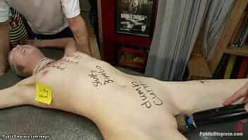 Filthy brunette slut Coral Aorta is tied by domme Princess Donna Dolore and ass fucked with dick on a stick then anal gangbang fucked in public tattoo shop by big cock Mr Pete video